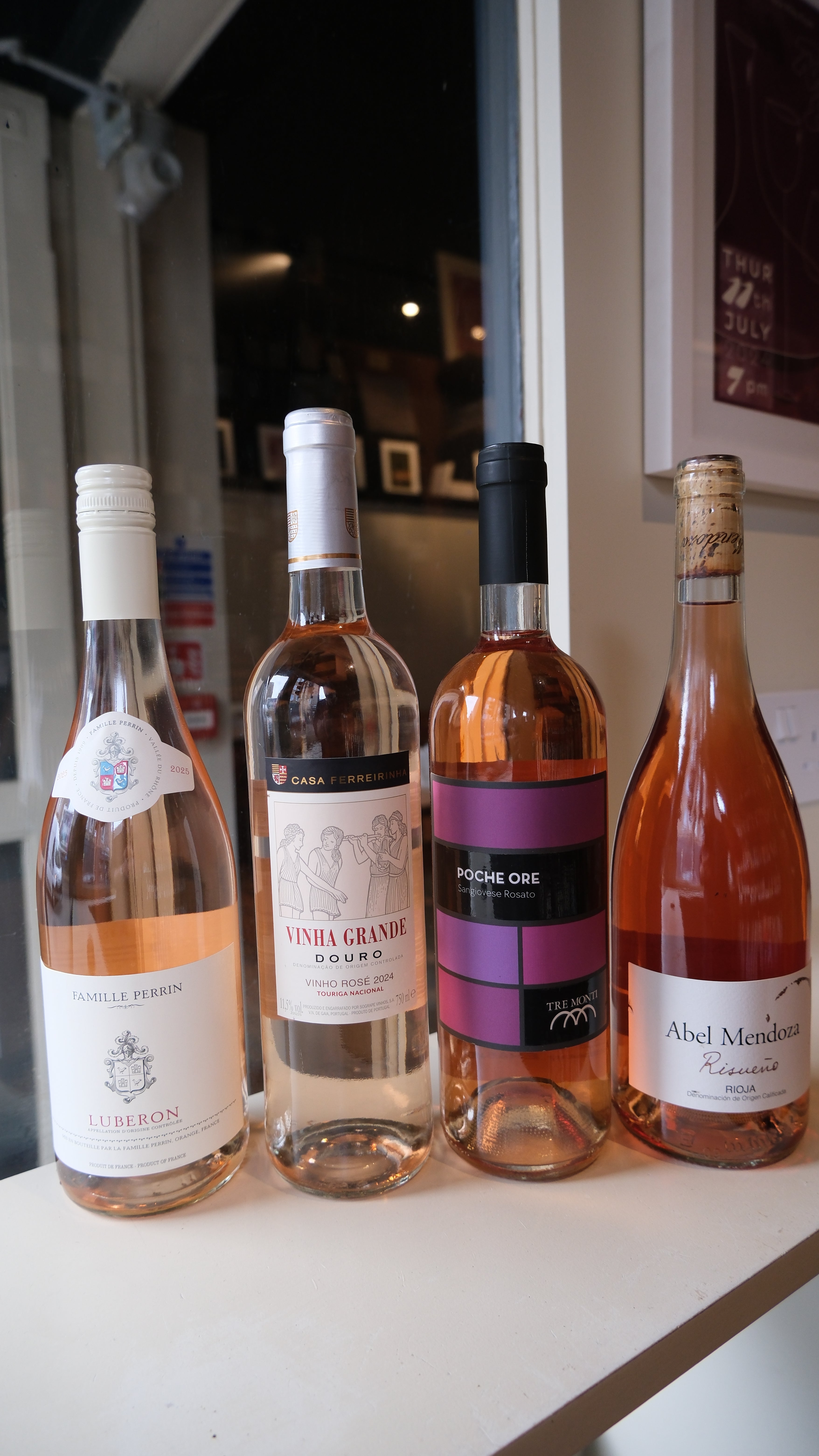 Ros&eacute; bottles lined up on the Ardfern counter